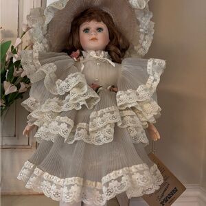Charming Porcelain Doll with Lace Dress and Hat like new